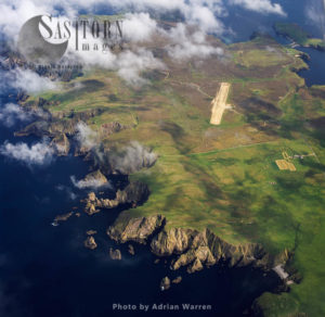 Fair Isle and its airfield, an island, halfway between Shetland and the Orkney Islands