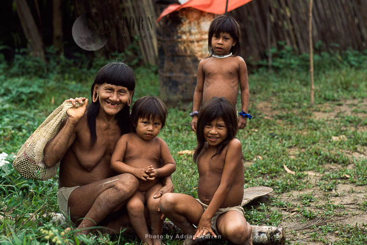 Waorani Indians, grandmother with children, Rio Cononaco, Ecuador, 1993