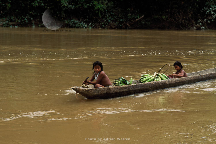 Waorani Indians, in rowing boat, Rio Cononaco, Ecuador, 1993