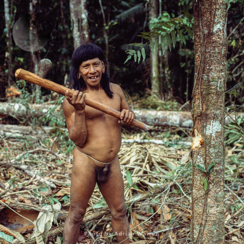Waorani Indians : Caempaede with Stone Axe, Rio Cononaco, Ecuador, 1983
