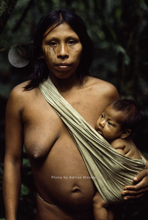 Waorani Indians, Mother and baby, Rio Cononaco, Ecuador, 1983