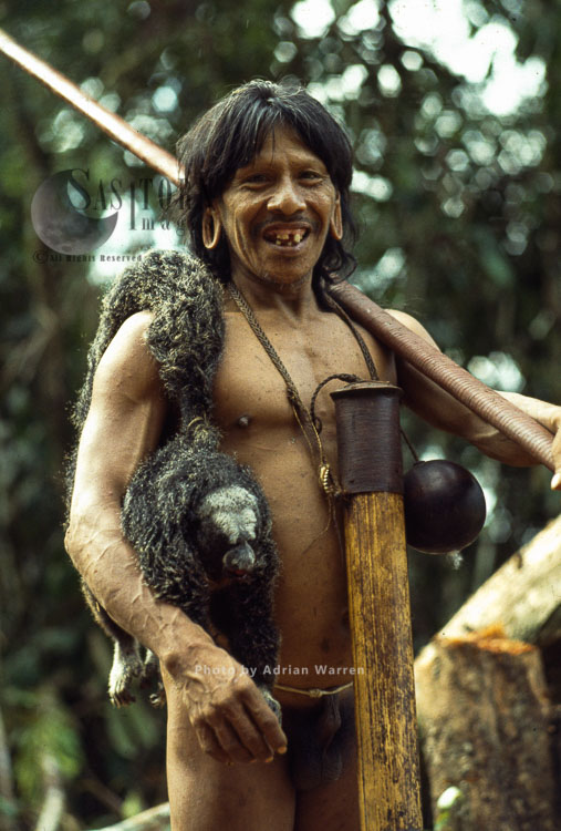 Waorani Indian, Caempaede after hunt with Saki Monkey, Cononaco Area, Ecuador, 1983