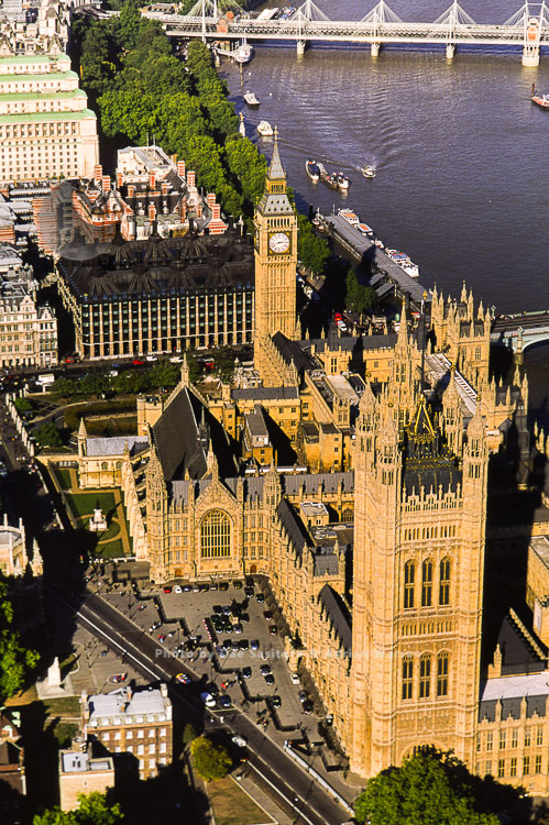 Palace of Westminster, view from the south side with Big Ben, Portcullis House, and Hungerford Bridge, London