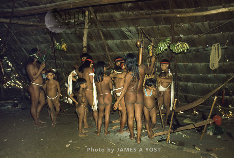 Waorani Indians: Waorani women at Gabaro dress and decorate for an aemae fiesta, Gabado, 1974, Ecuador