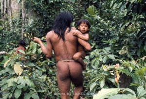 Waorani Indians: On trips longer than a couple of hours, youngsters are given a lift, Gabado, 1975, Ecuador