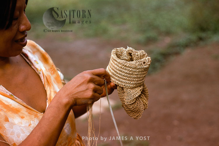 Waorani Indians: Chambira palm fiber made into twine is used for various articles, like a fishnet, Tewaeno, 1975, Ecuador