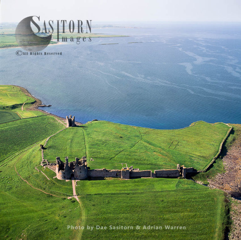 Dunstanburgh Castle, a 14th-century fortification, near Craster , Northumberland